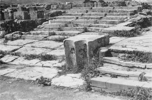 Plate 11 Mallia. Part of the east front of the West Wing, with stairs leading into area VI (right) and up to the first floor (left)