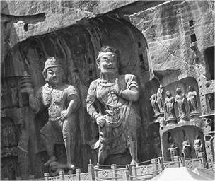 These massive guardians from the central Fengxian Temple at the Longmen Buddhist grottoes near today’s Luoyang protect the nearby image of a sitting female Buddha said to be modeled on Tang Empress Wu.