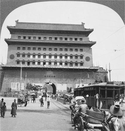 From the fifteenth century on, Beijing (renamed Beiping, or Northern Peace, in 1927) was known for its magnificent walls and gates, including Qianmen, the 138-feet-high “Front Gate" of the inner city, photographed here with a mixture of rickshaw pullers, cars, trucks, and electric trams in 1931