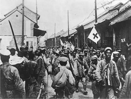 Ill equipped and no match for Japan’s powerful modern army, Chiang Kai-shek’s Nationalist forces enter the Shandong city of Tai’an in 1937 as they retreat from the invading Japanese