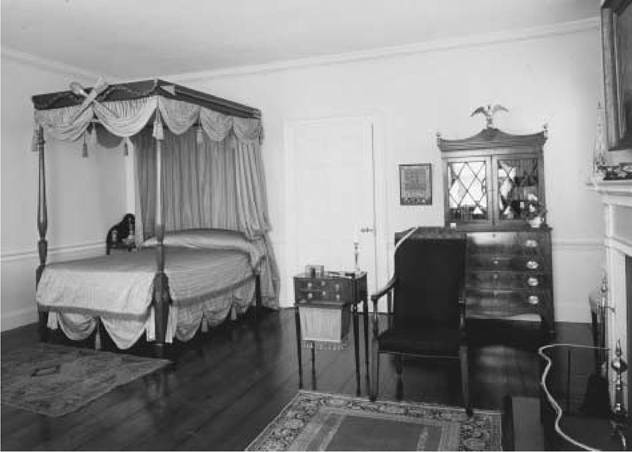 The Gardner-Pingree House. A first floor bedroom in the Gardner-Pingree House, designed by Samuel Mclntire for John Gardner, a prominent merchant, and built in 1804 in Salem, Massachusetts.