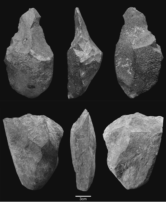 Photo of a very early bifacial cleaver and pick from Spain.