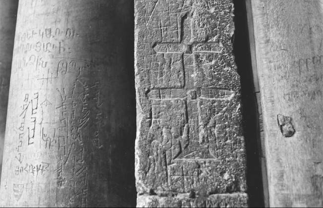 Pilgrim graffiti at the Church of the Holy Sepulchre. Tens of thousands of crosses and names were carved into the church’s stone by medieval pilgrims. (Courtesy Alfred Andrea) Pilgrim graffiti at the Church of the Holy Sepulchre. Tens of thousands of crosses and names were carved into the church’s stone by medieval pilgrims. (Courtesy Alfred Andrea)